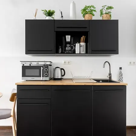 Global Living - Design I Rathausplatz I Kitchen I Apartamento