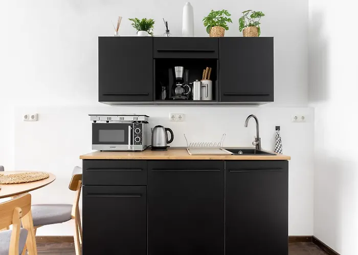 Global Living - Design I Rathausplatz I Kitchen I Апартаменты